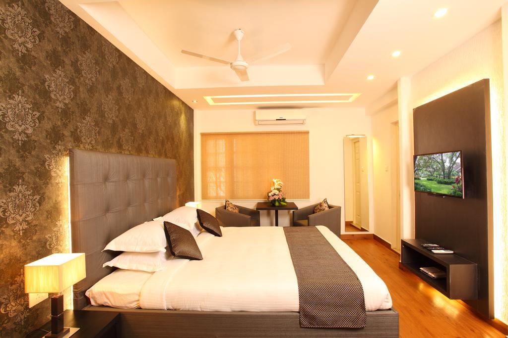 Hotel Luciya Palace Thrissur Pokoj fotografie